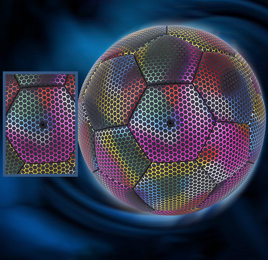 Reflective Size 5 football creating a holographic glow when photographed with a smartphone flash during an evening football session